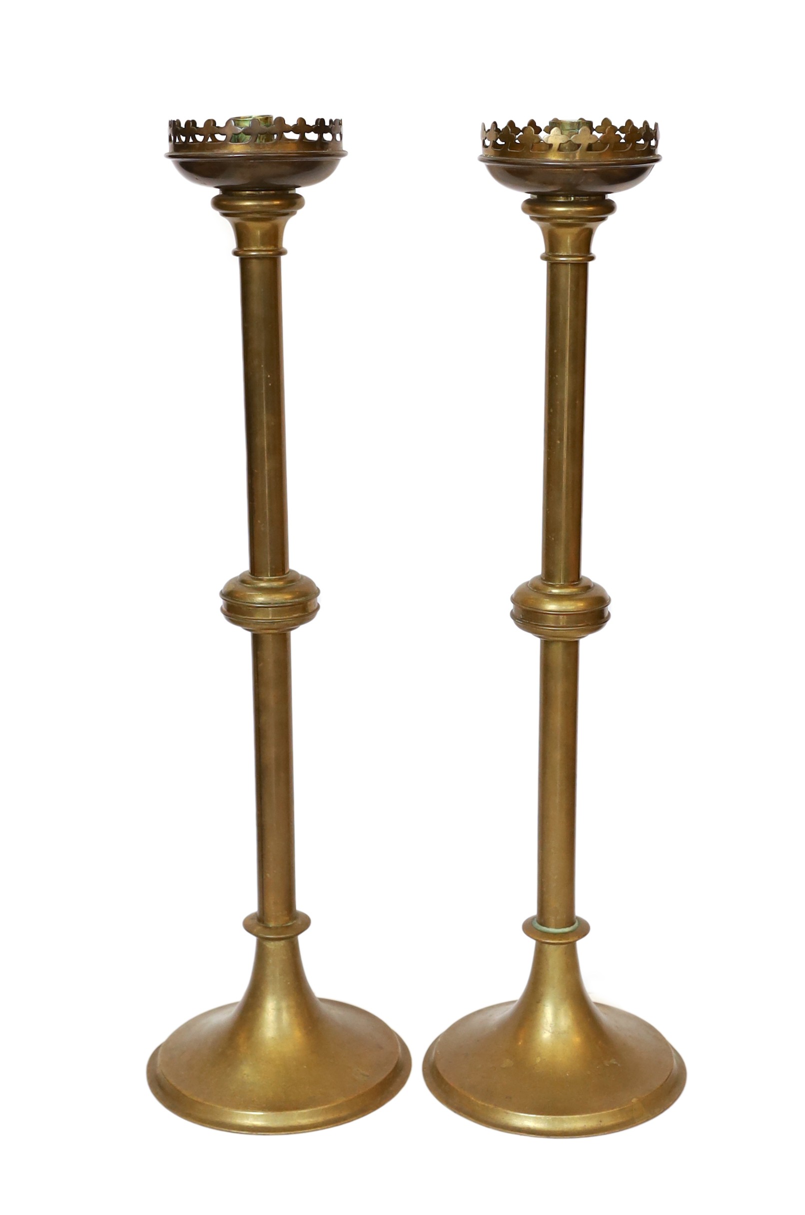 A pair of early 20th century English brass altar sticks, height 61cm